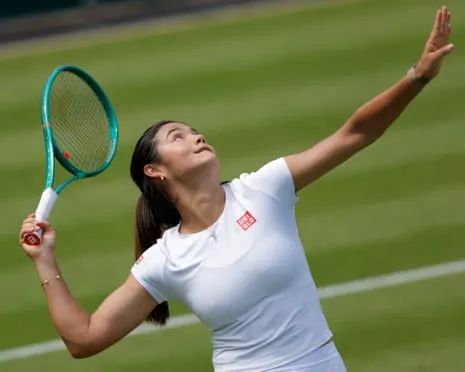 Emma Raducanu serves while practicing on Court 3