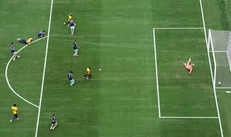 Ecuador's Nilson Angulo scores their first goal past Germany's Manuel Neuer.