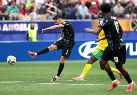 Stephen Eustáquio scores Canada’s late winner at Los Angeles Stadium.