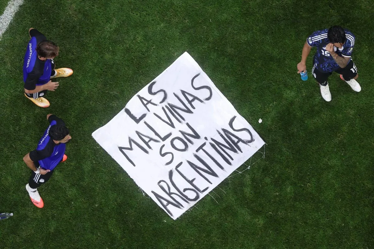 Argentina players display Falklands banner after World Cup semi-final victory over England