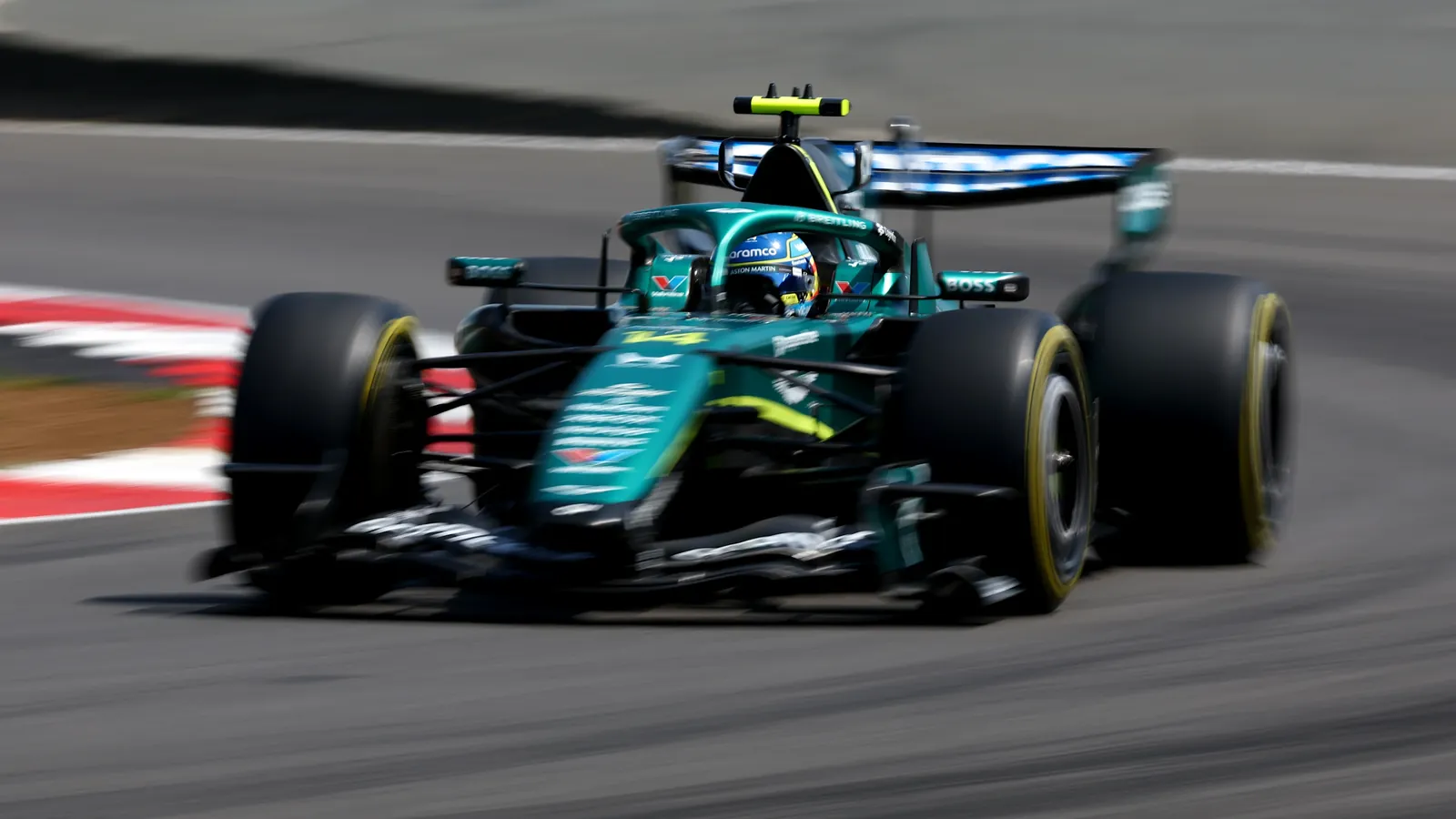 NORTHAMPTON, ENGLAND - JULY 03: Fernando Alonso of Spain driving the (14) Aston Martin F1 Team